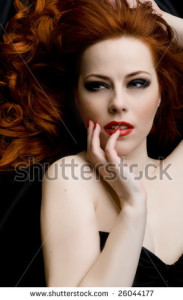 stock-photo-sexy-redhead-young-woman-26044177